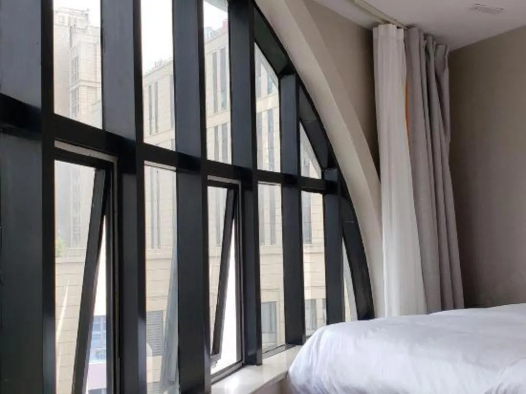 Bed in Gya Hotel Shanghai Xizang Bei Road Metro Station