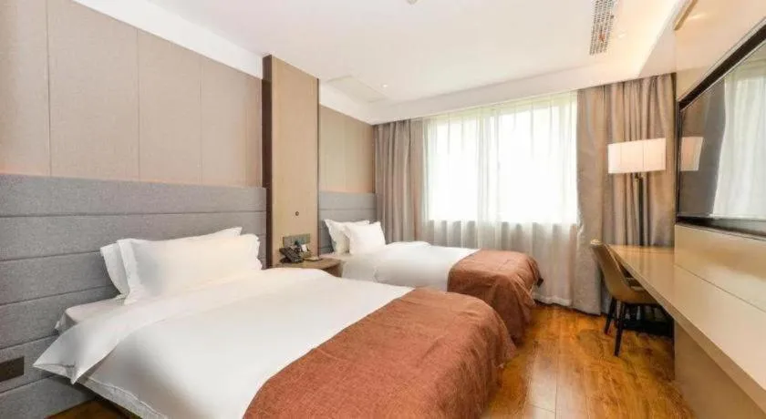 Bed in Gya Hotel Shanghai Xizang Bei Road Metro Station