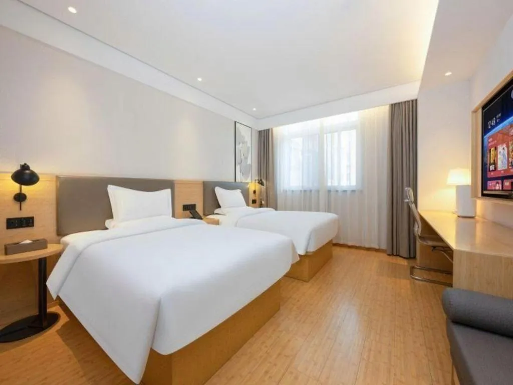 Bed in Green Tree Inn Xuzhou Tongshan Wanda Plaza Yuquanhe Metro Station