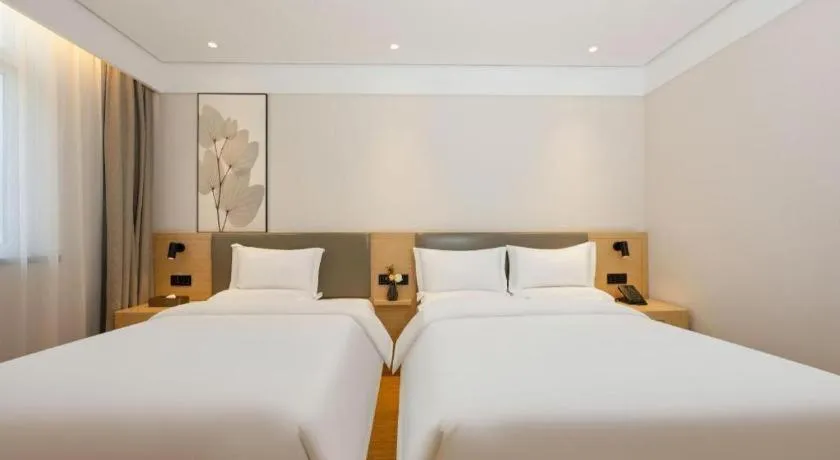 Bed in Green Tree Inn Xuzhou Tongshan Wanda Plaza Yuquanhe Metro Station