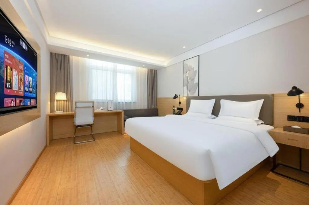 Bed in Green Tree Inn Xuzhou Tongshan Wanda Plaza Yuquanhe Metro Station