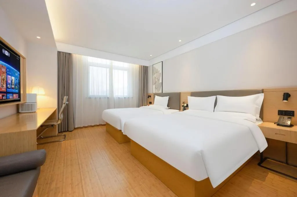 Bed in Green Tree Inn Xuzhou Tongshan Wanda Plaza Yuquanhe Metro Station