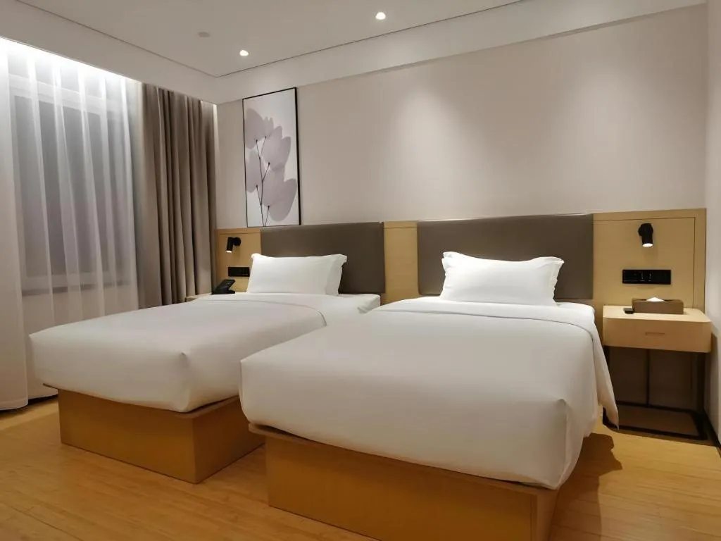 Bed in Green Tree Inn Xuzhou Tongshan Wanda Plaza Yuquanhe Metro Station