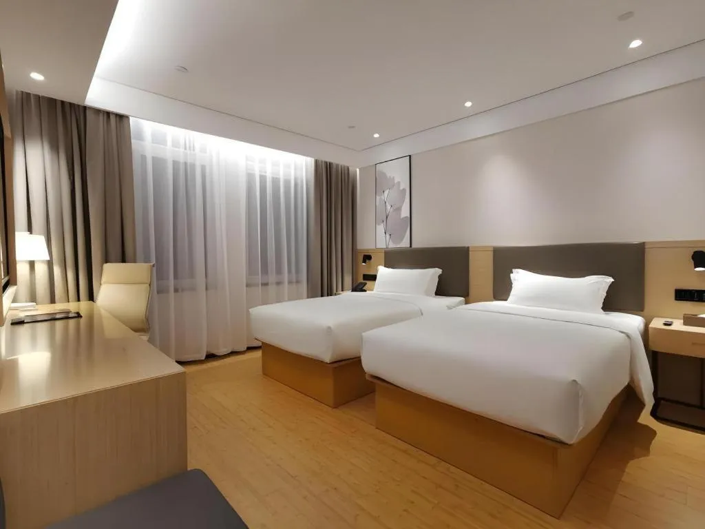 Bed in Green Tree Inn Xuzhou Tongshan Wanda Plaza Yuquanhe Metro Station