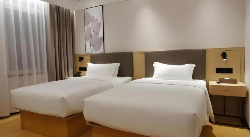 Bed in Green Tree Inn Xuzhou Tongshan Wanda Plaza Yuquanhe Metro Station