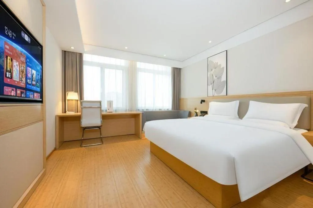 Bed in Green Tree Inn Xuzhou Tongshan Wanda Plaza Yuquanhe Metro Station