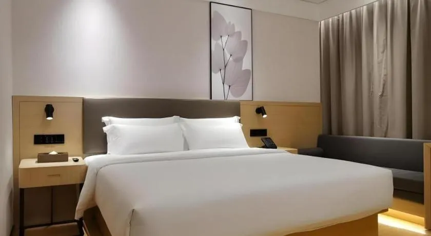 Bed in Green Tree Inn Xuzhou Tongshan Wanda Plaza Yuquanhe Metro Station