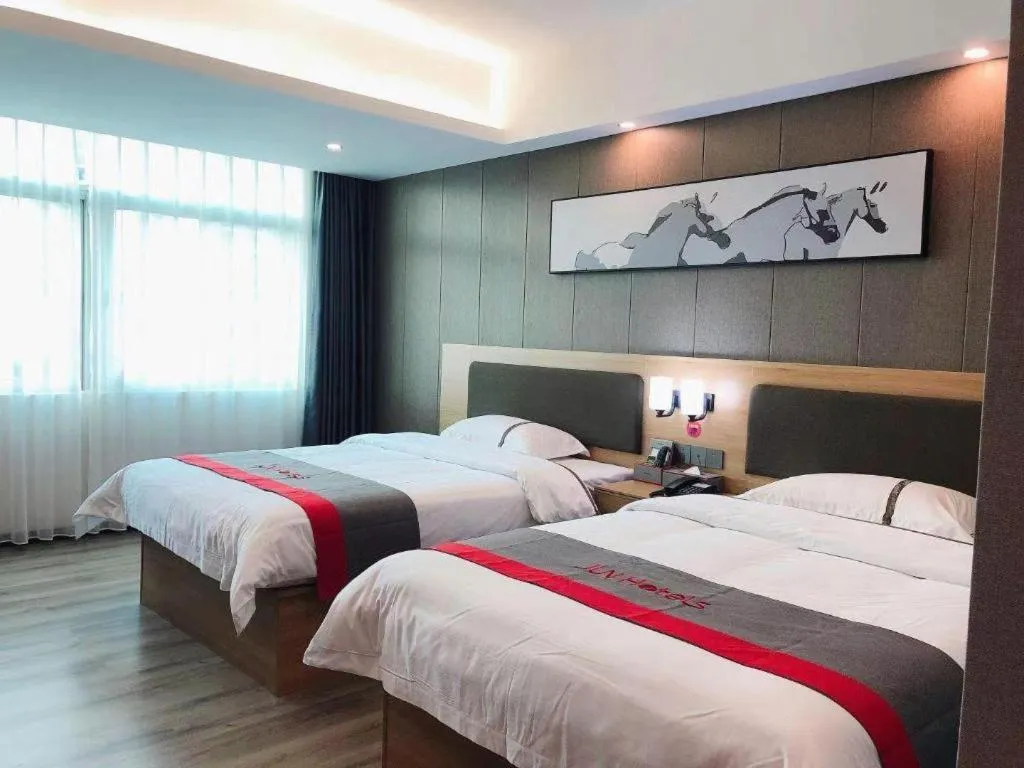 Bed in Jun Hotel Guangdong Zhanjiang Xiashan South Railway Station