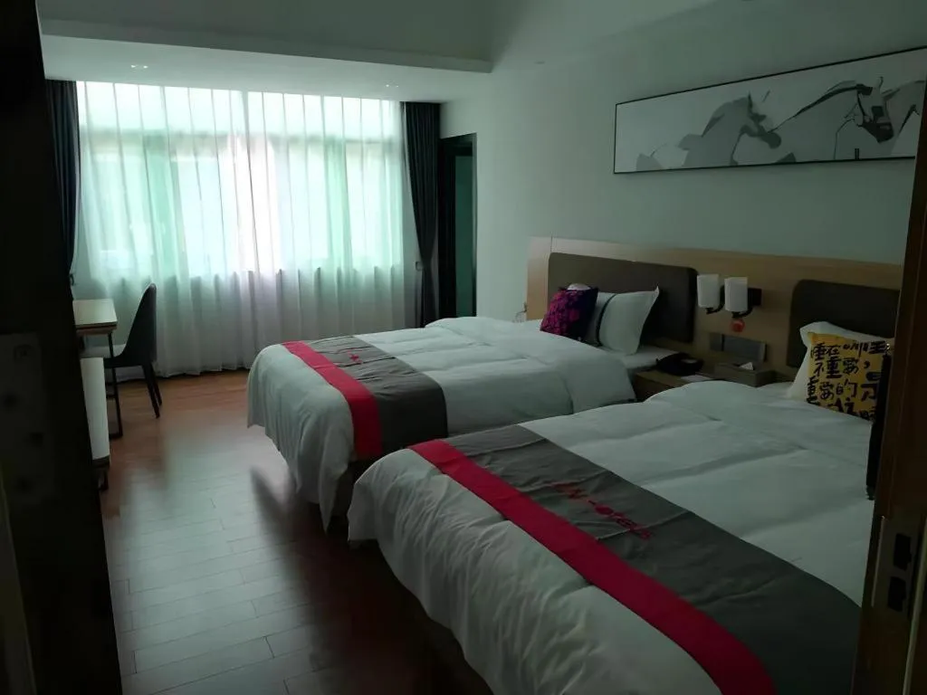 Bed in Jun Hotel Guangdong Zhanjiang Xiashan South Railway Station