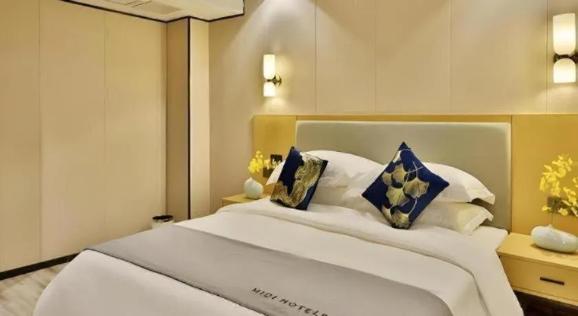 Bed in MIDI Hotel Guangdong Chaozhou Xiangqiao District Hanshan Teachers College