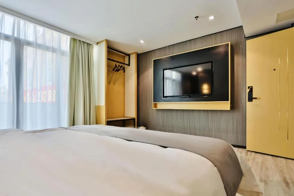 Bed in MIDI Hotel Guangdong Chaozhou Xiangqiao District Hanshan Teachers College