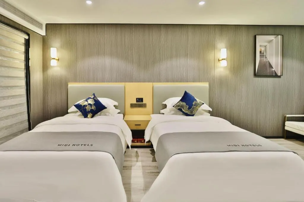 Bed in MIDI Hotel Guangdong Chaozhou Xiangqiao District Hanshan Teachers College