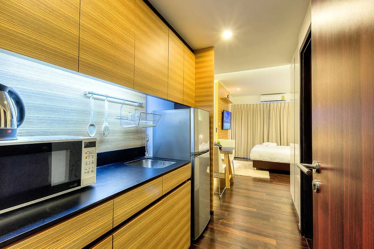 Kitchen or kitchenette, Bed in The Title Boutique Phuket