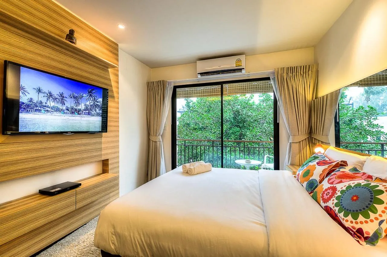 Photo of the whole room, Bed in The Title Boutique Phuket