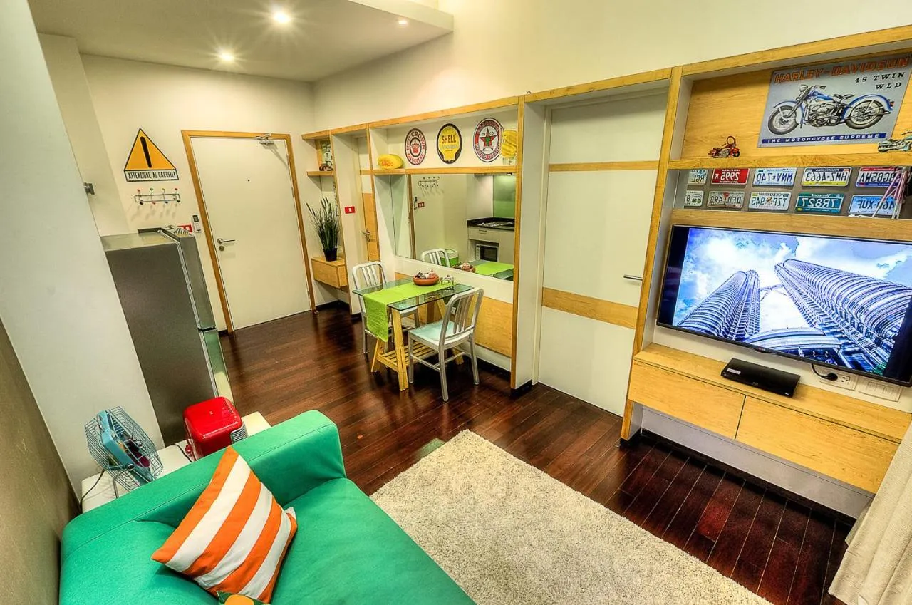 Communal lounge/ TV room in The Title Boutique Phuket