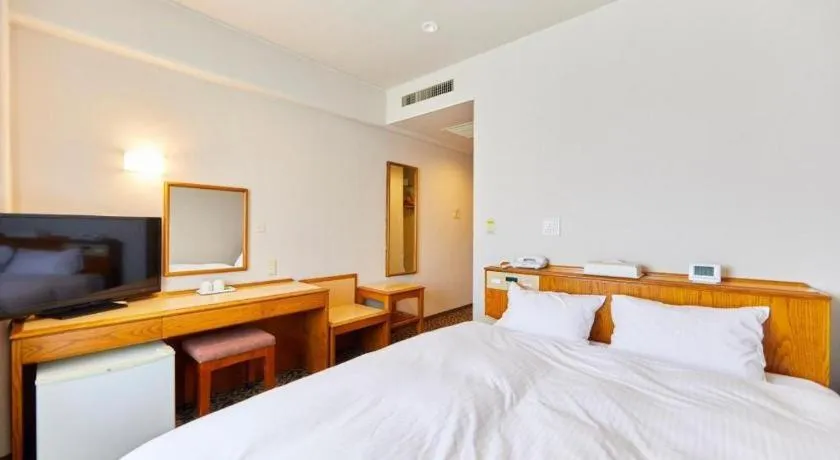 Bed in Inuyama Central Hotel