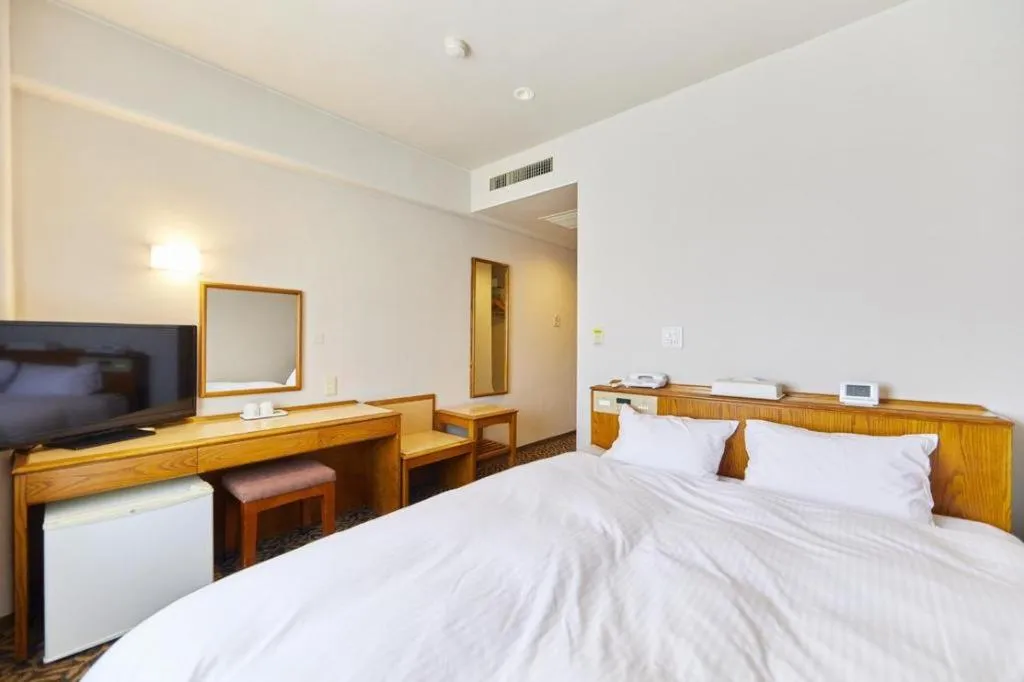 Bed in Inuyama Central Hotel