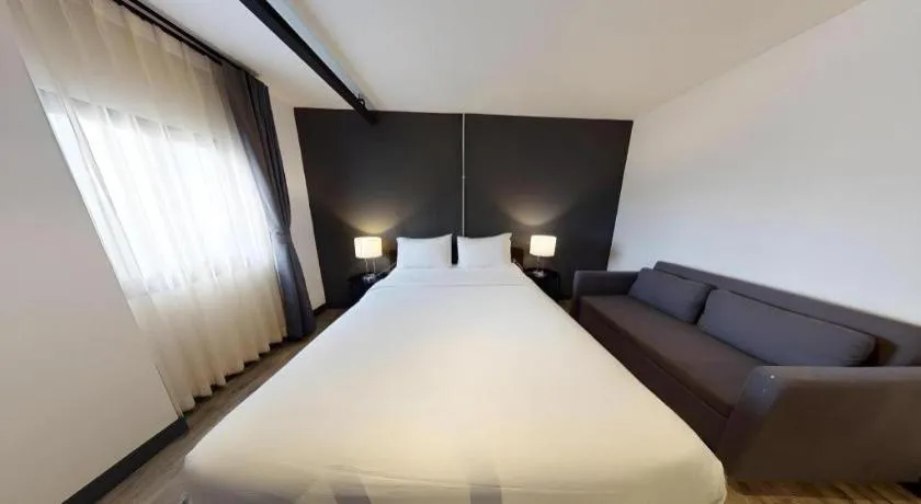 Bed in ZK Hotel Chiangmai