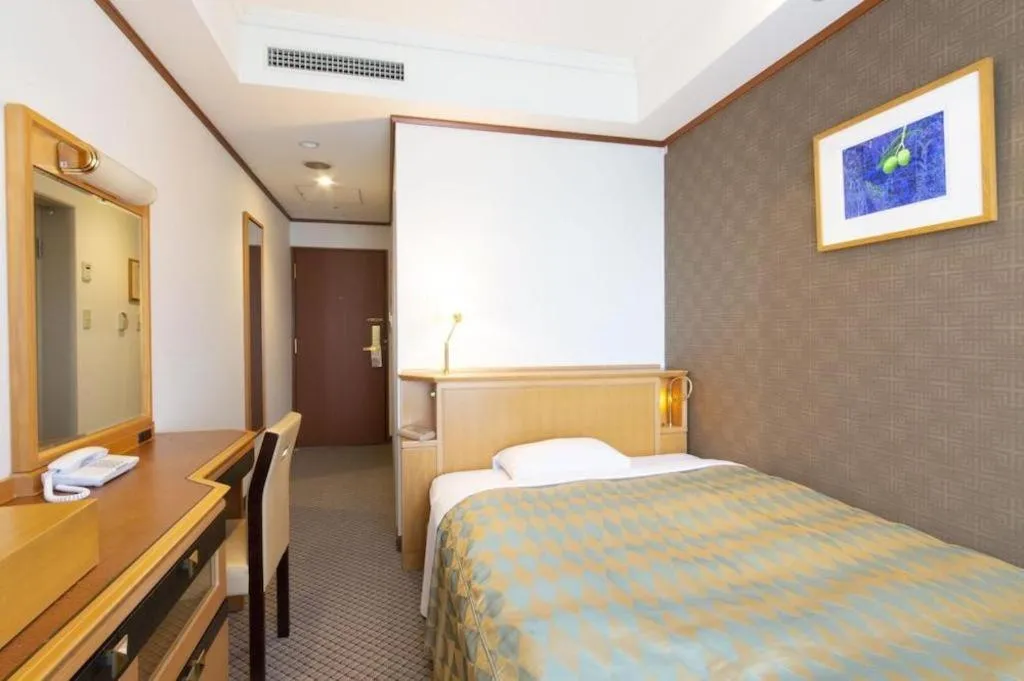 Bed in Hotel Le Port Kojimachi