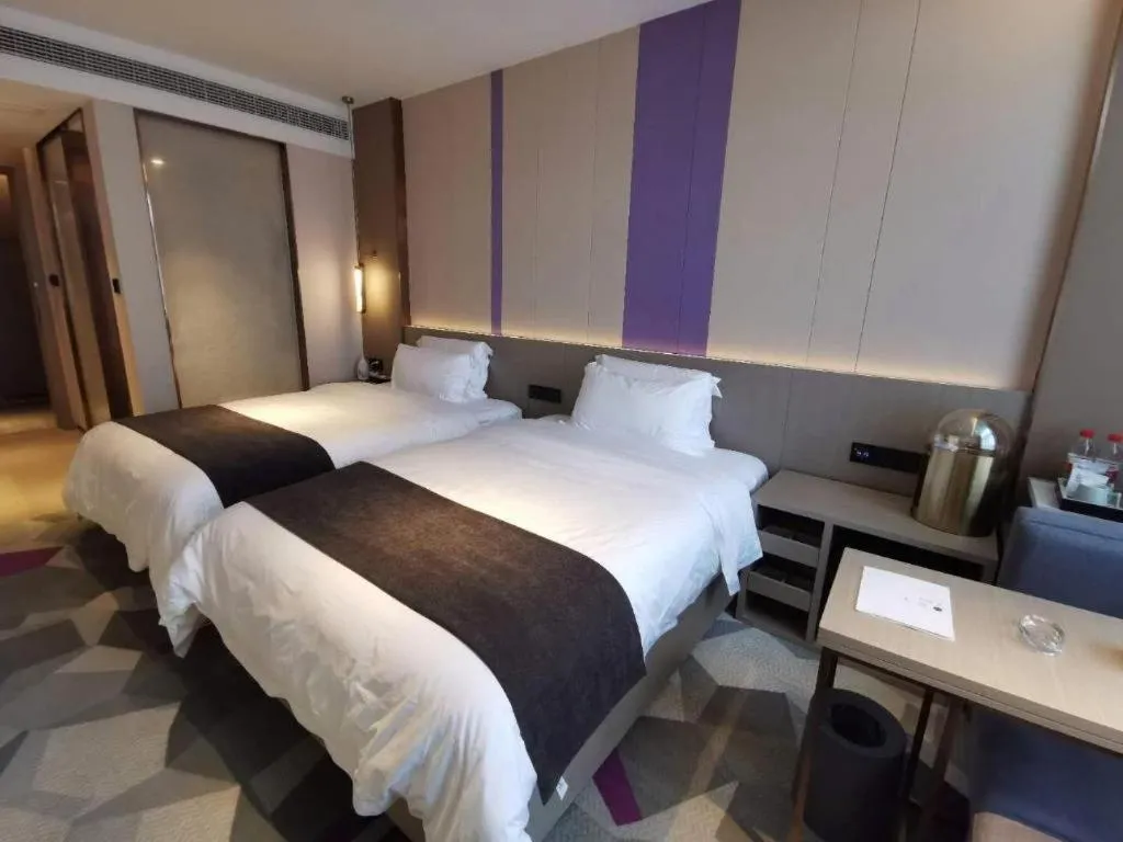 Bed in Lavande Hotel Shanghai Jing'an Shibei Gaoxin