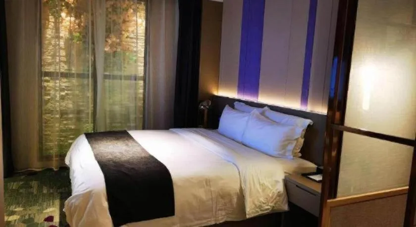 Bed in Lavande Hotel Shanghai Jing'an Shibei Gaoxin