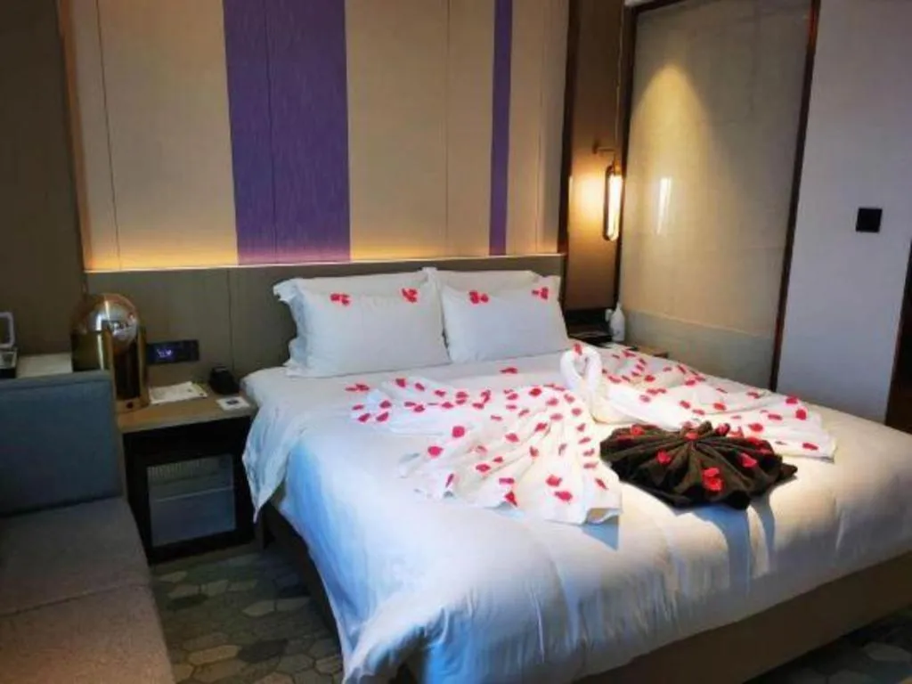 Bed in Lavande Hotel Shanghai Jing'an Shibei Gaoxin