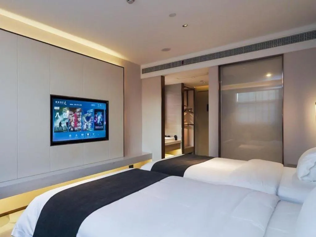 Bed in Lavande Hotel Shanghai Jing'an Shibei Gaoxin