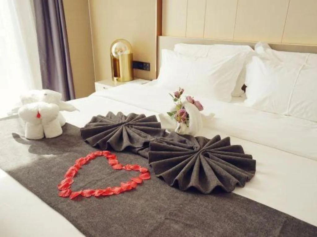 Bed in Lavande Hotel Shanghai Jing'an Shibei Gaoxin