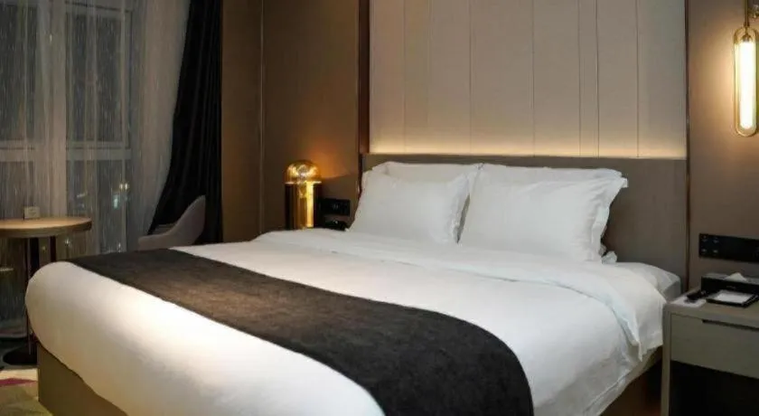 Bed in Lavande Hotel Shanghai Jing'an Shibei Gaoxin