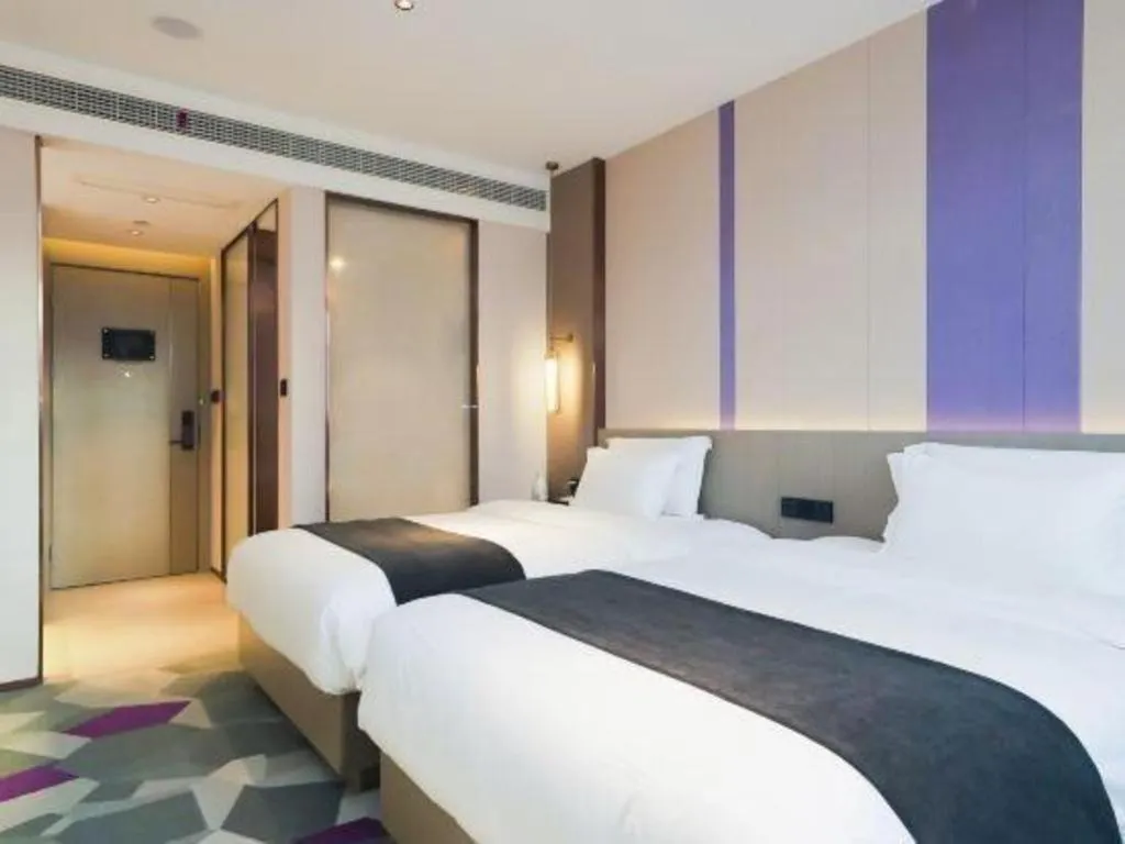 Bed in Lavande Hotel Shanghai Jing'an Shibei Gaoxin