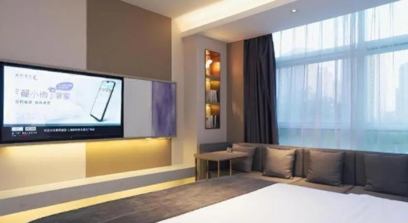 Bed in Lavande Hotel Shanghai Jing'an Shibei Gaoxin