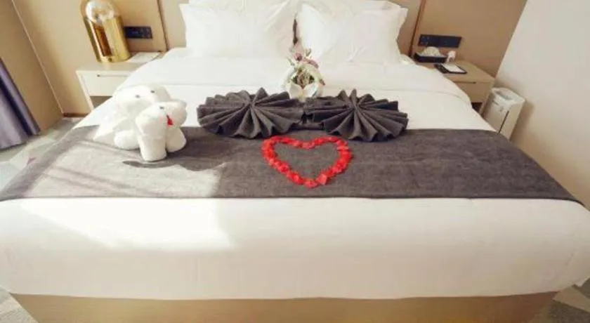 Bed in Lavande Hotel Shanghai Jing'an Shibei Gaoxin