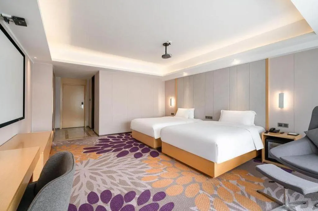 Bed in Lavande Hotel Maoming High-speed Railway Station Xinfu Road