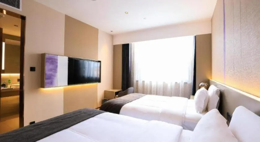 Bed in Lavande Hotel Zhongshan Shiqi Daxinxinduhui North Zhongshan Station