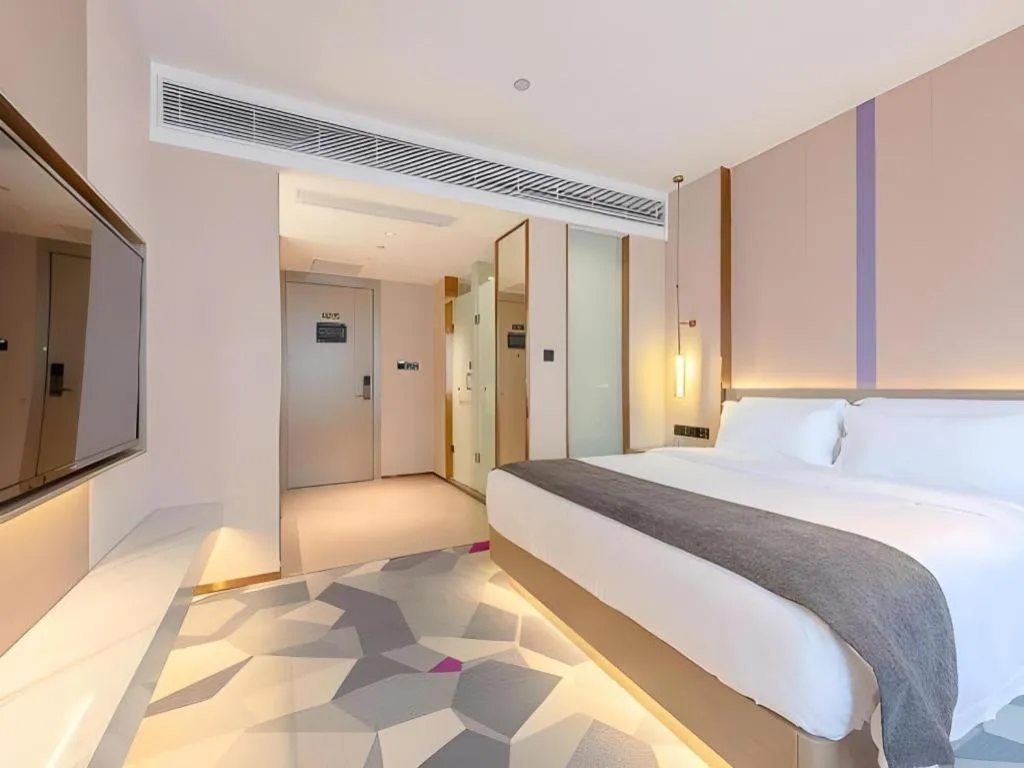 Bed in Lavande Hotel Zhongshan Shiqi Daxinxinduhui North Zhongshan Station