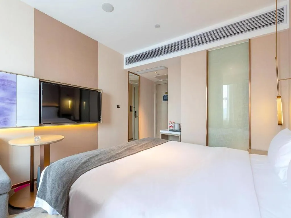 Bed in Lavande Hotel Zhongshan Shiqi Daxinxinduhui North Zhongshan Station