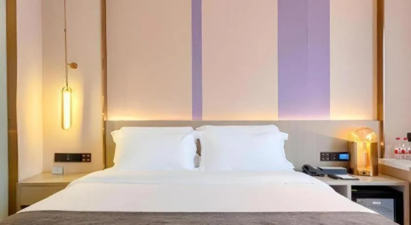 Bed in Lavande Hotel Zhongshan Shiqi Daxinxinduhui North Zhongshan Station
