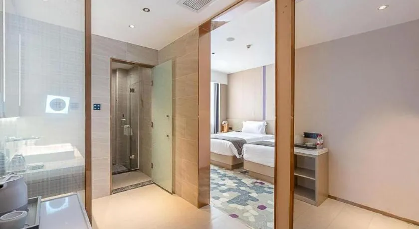 Bed in Lavande Hotel Zhongshan Shiqi Daxinxinduhui North Zhongshan Station