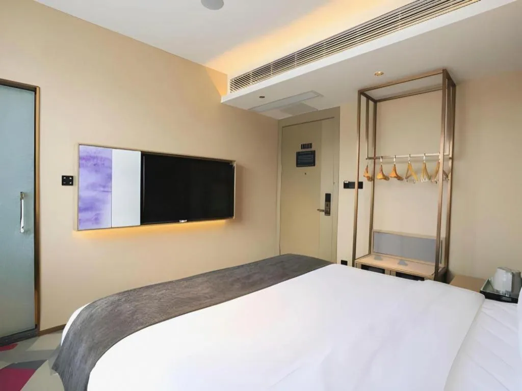 Bed in Lavande Hotel Zhongshan Shiqi Daxinxinduhui North Zhongshan Station