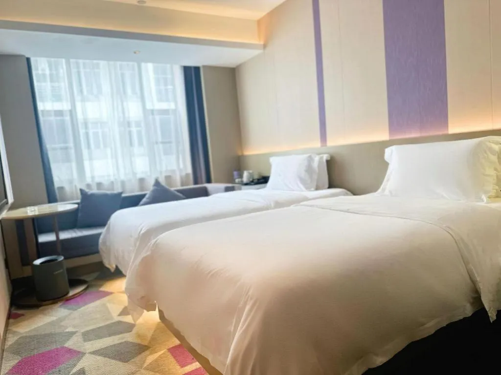 Bed in Lavande Hotel Zhongshan Shiqi Daxinxinduhui North Zhongshan Station