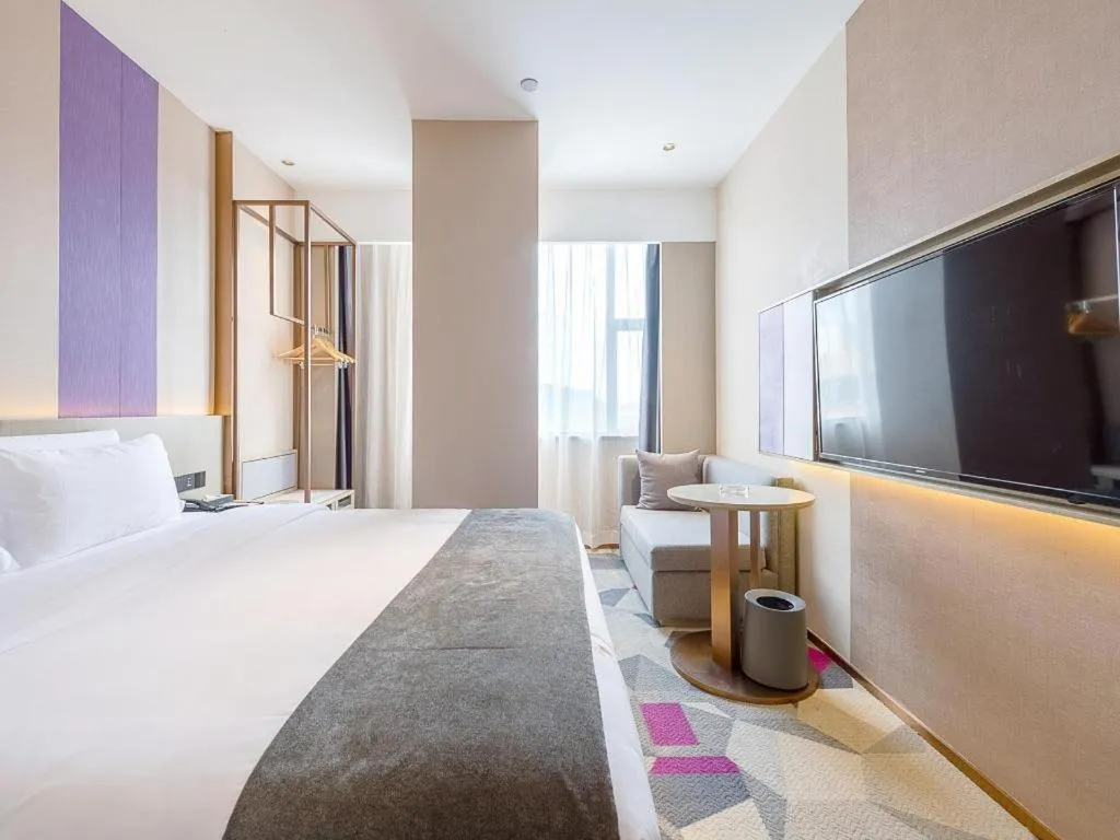 Bed in Lavande Hotel Zhongshan Shiqi Daxinxinduhui North Zhongshan Station