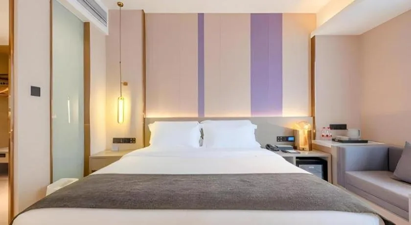 Bed in Lavande Hotel Zhongshan Shiqi Daxinxinduhui North Zhongshan Station
