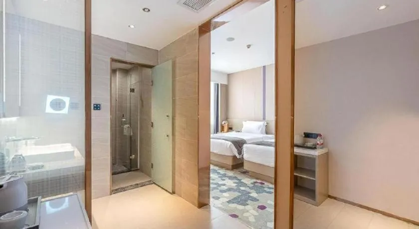 Bed in Lavande Hotel Zhongshan Shiqi Daxinxinduhui North Zhongshan Station