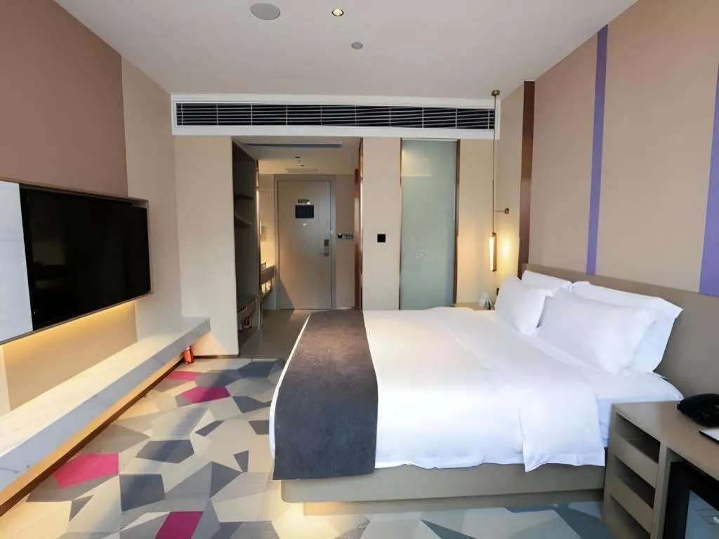 Bed in Lavande Hotel Zhongshan Shiqi Daxinxinduhui North Zhongshan Station