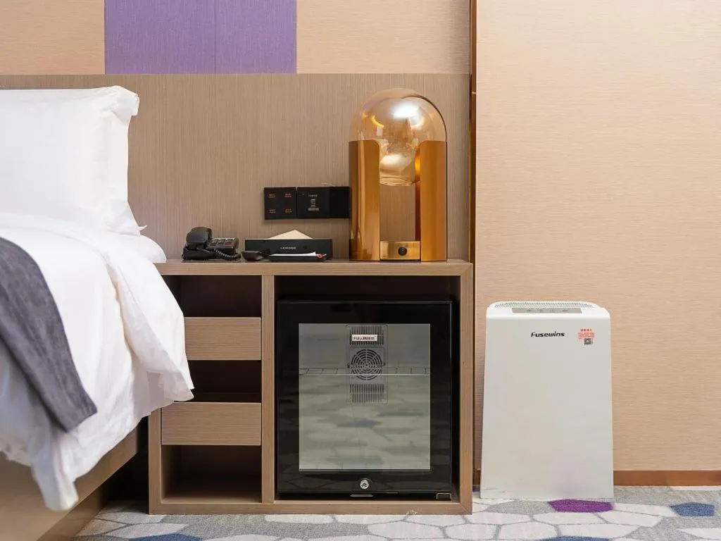 Bed in Lavande Hotel Zhongshan Shiqi Daxinxinduhui North Zhongshan Station