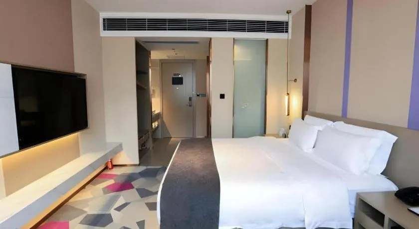 Bed in Lavande Hotel Zhongshan Shiqi Daxinxinduhui North Zhongshan Station