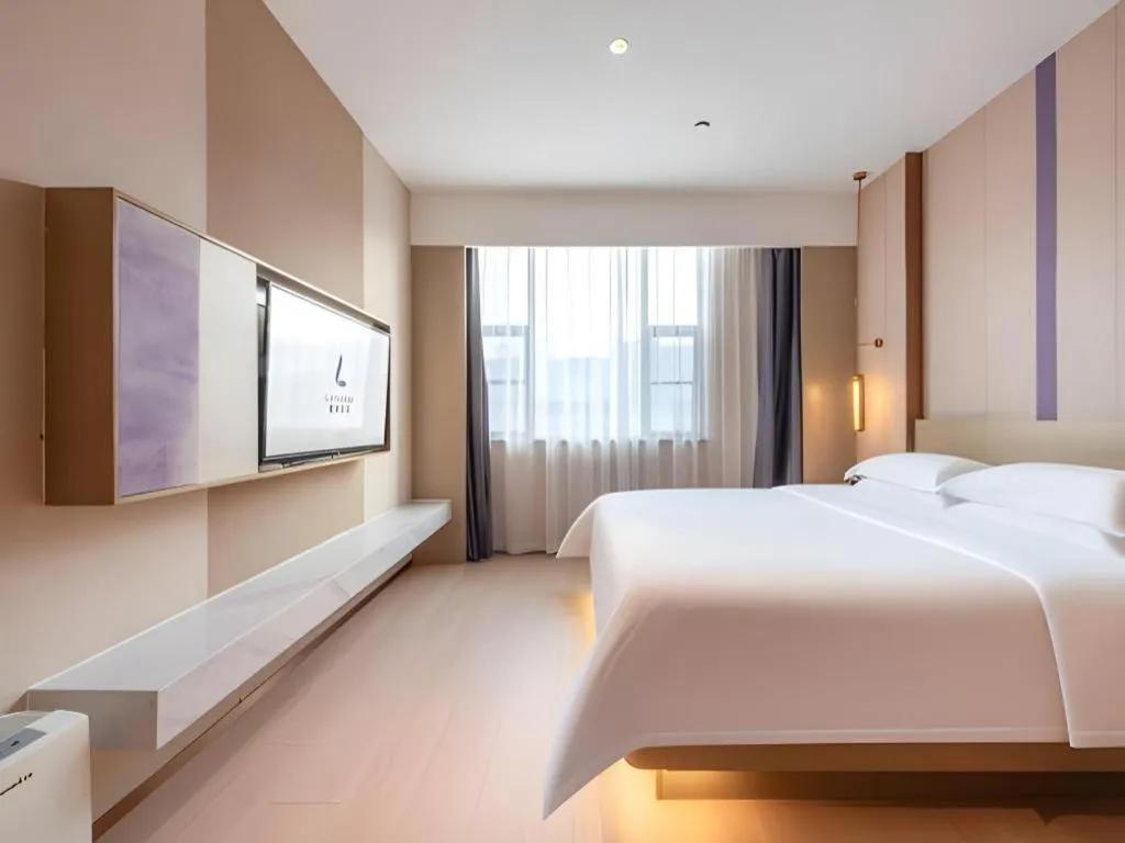 Bed in Lavande Hotel Zhongshan Shiqi Daxinxinduhui North Zhongshan Station
