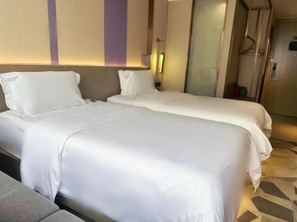 Bed in Lavande Hotel Zhongshan Shiqi Daxinxinduhui North Zhongshan Station