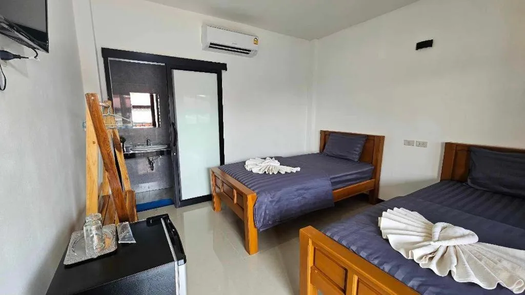 Bed in HotelBanAunirukChiangrai