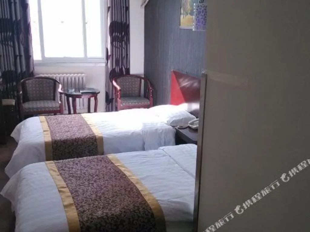 Bed in Super 8 Hotel Beijing South Railway Station Majiabao Metro Station